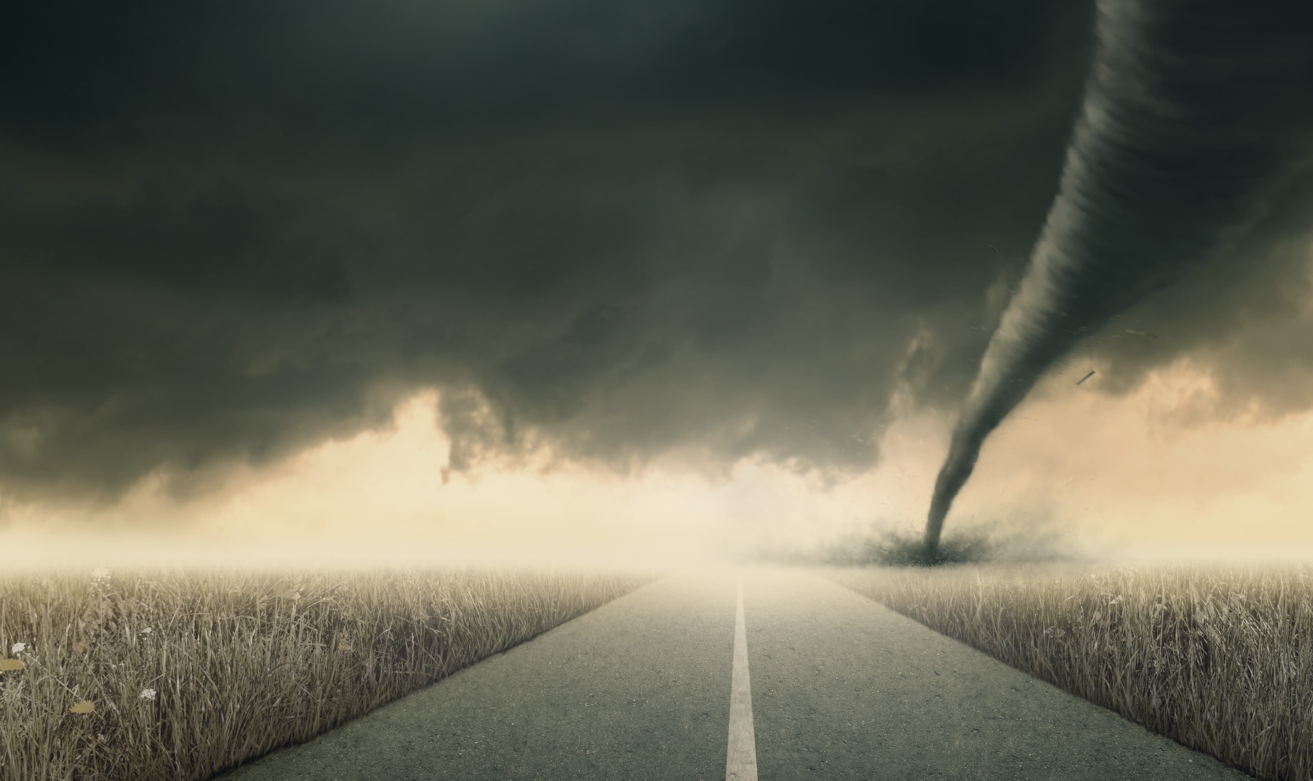 Tornado In Field Near Road